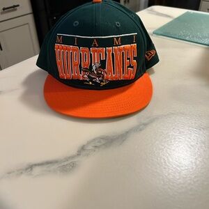Vintage Miami Hurricanes NCAA New Era SnapBack Cap with Orange Brim